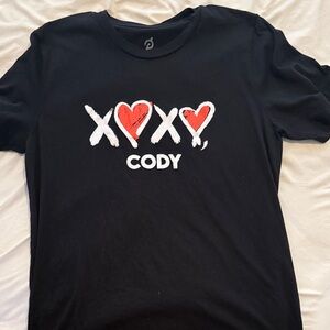 Peloton XOXO Cody Black Tee with Red and White Design